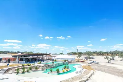 swimming pool and clubhouse at Firefly Resort in Fredericksburg