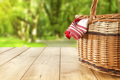 picnic basket sitting outside 